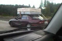 This is not how you transport a mattress.