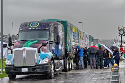 The U.S. Capitol Christmas Tree drew a crowd of visitors at Lake Union Park in Seattle as it made brief stop on its tour of the Lower 48 States to Washington, D.C.
