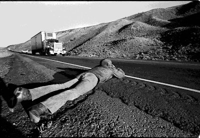 John Rogers gets closeup footage for the Optic Nerve documentary “On the boulevard.” © Lynn Adler