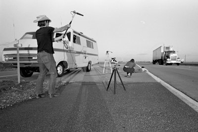 The Optic Nerve crew, working from their motor home, records trucking footage. © Lynn Adler