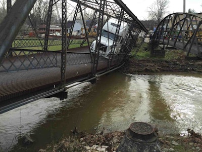 This truck crashed into and caused the partial collapse of a 135-year-old cast-iron bridge in Paoli, Ind. on Christmas Day. (Orange County Sheriff photo)