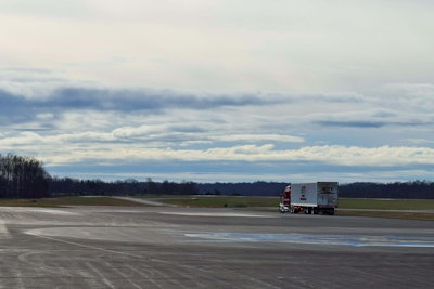 Eti Truck On Runway Aaron Tippin