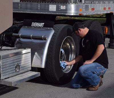 Staged at a small Marathon truck-stop just off U.S. Highway 70S and Airport Rd. in Sparta, Justice does a little last-minute polishing of the unit for the video shoot.
