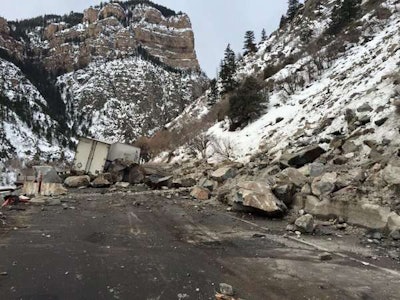 A tractor-trailer got caught in a rockslide Monday along I-70 in Glenwood Canyon in Colorado. Photo courtesy of the Colorado DOT.