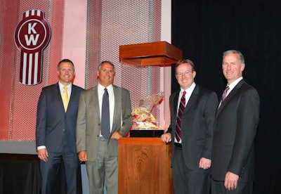 Papé Kenworth was awarded the 2015 Kenworth Dealer of the Year Award. Shown from left are Jason Skoog, Kenworth assistant general manager for sales and marketing; Dave Laird, president of Papé Kenworth; Jordan Papé, chief executive officer of The Papé Group Inc., and Preston Feight, Kenworth general manager and Paccar vice president. The Papé Group Inc. is the parent company of Papé Kenworth.