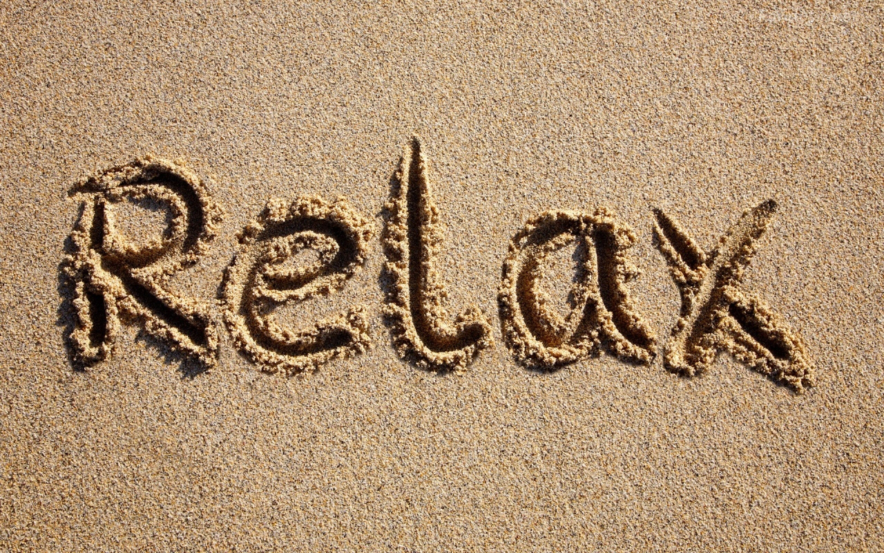 relax-written-in-sand