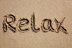 relax-written-in-sand