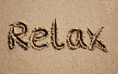 relax-written-in-sand