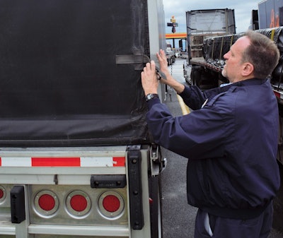 View of the back of Bowers' Reitnouer and the Vango kit, parked after a brief bit of truck-stop traffic jam getting into this spot.