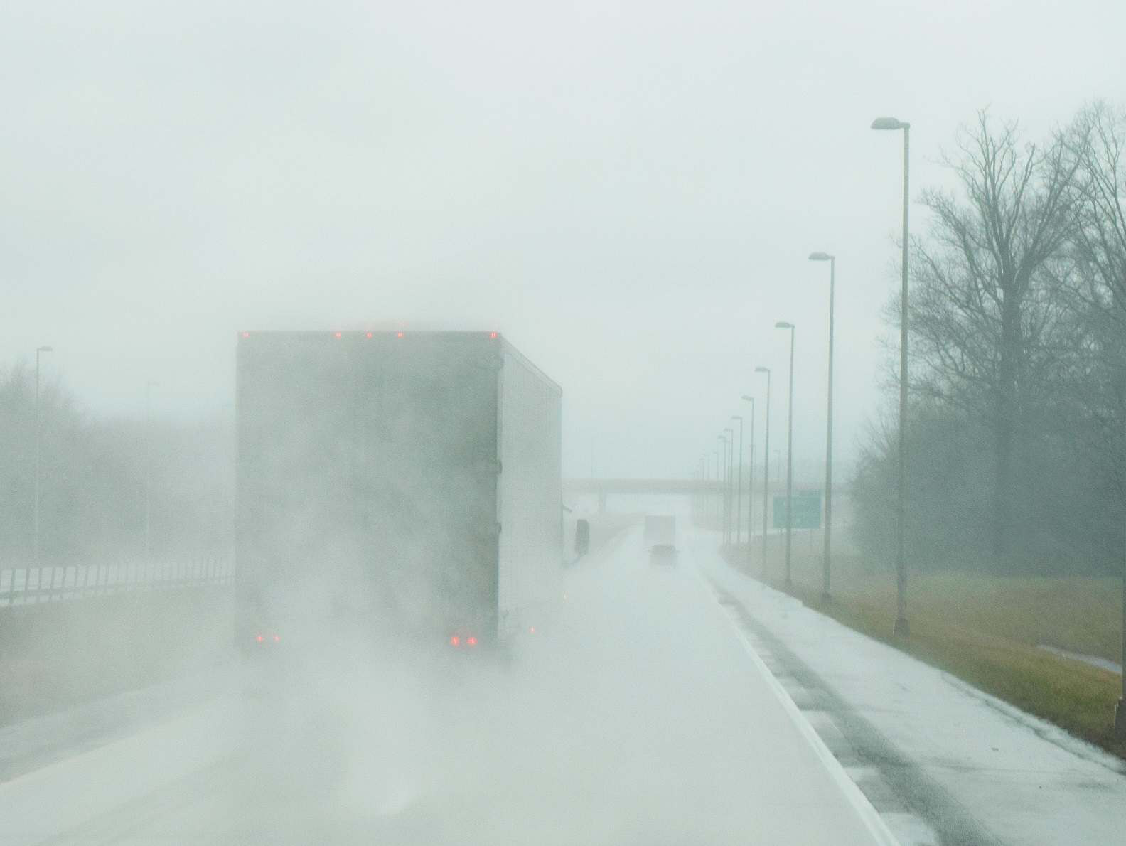 truck-on-highway-in-rain