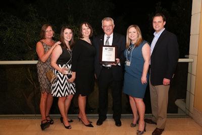 Danny Smith accepting his award at this year’s TCA convention.