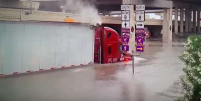 This truck plowed through the flood waters and made it through unscathed.