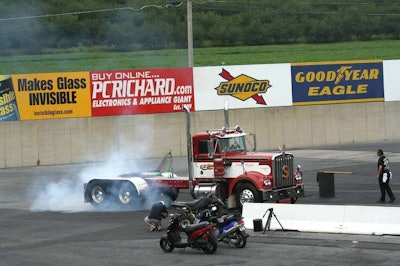 The Dirty Dozen 1971 Model A Kenworth taking off at a competition