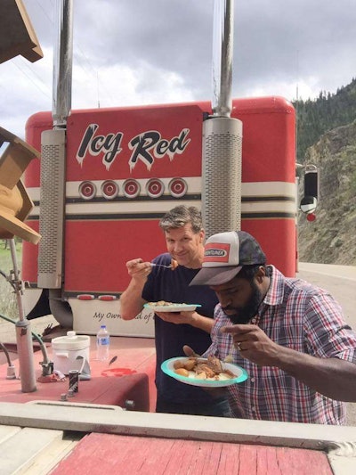 “Kevin and I having a little lunch alongside a river in northern Idaho. I made a roast with carrots and potatoes and onions. I did the cooking so he had to do the cleaning. Division of labor -- Great days of trucking”