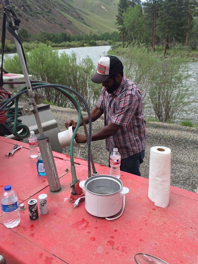 “Kevin and I having a little lunch alongside a river in northern Idaho. I made a roast with carrots and potatoes and onions. I did the cooking so he had to do the cleaning. Division of labor — Great days of trucking.” –Todd Campbell