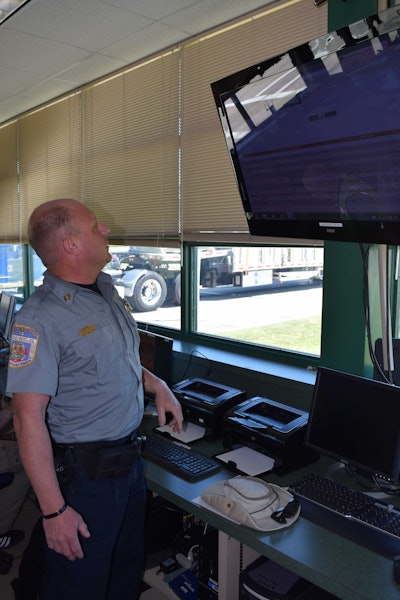 Capt. Matthew Lott keeps an eye on the monitor that provides information about the trucks crossing the scales. This particular weigh station has thermal imaging that can detect if a truck’s tires are underinflated, which would give off a higher heat signature. Mississippi DOT’s computer system also reads the license plates and DOT numbers of the trucks before they hit the scales, allowing officers to see any previous inspection data, out-of-service data and more about the truck and driver.