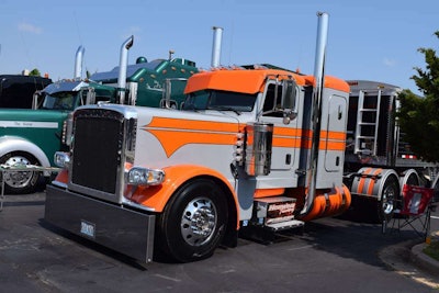 This 2014 Peterbilt 389 glider was built in-house by Howeing Trucking. Th e truck’s driver, Kevin Benson, is showing the combo at SuperRigs.