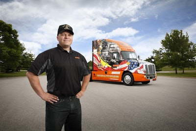 Schneider driver Jon Ritscher with 2016’s Freightliner Ride of Pride truck.