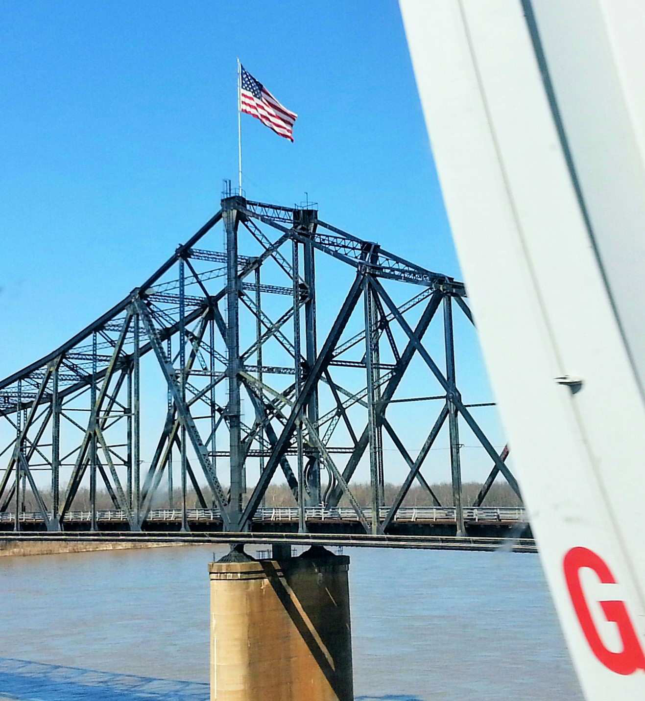 American-flag-over-bridge
