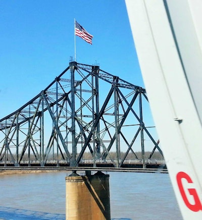 American-flag-over-bridge