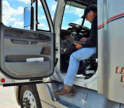 Buchs checks in on the load board during the two-hour unload at the tail end of the run. He was planning then not the next load, which he’s pick up early the next morning, but looking farther down the line to the one after that.