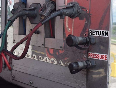 Hydraulics operated via PTO power the rear liftgate and allow for adjustments in the interior configurations during load and unload.