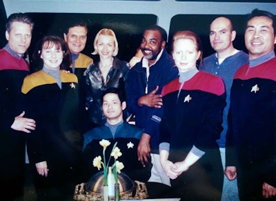 Some of the best Hollywood credits for Nowak (center, rear) are from her work with the “Star Trek” franchise. Her roles included standing in for Jeri Ryan during the fourth season through the end of the seven-season “Star Trek: Voyager” series. She also had small roles, including one as a dying crew member in the episode “Scientific Method.” Nowak also was a Voyager officer and in a sickbay scene in the movie “Star Trek: Insurrection.”
