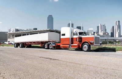 National Champion, Limited-Mileage Combo | Jordan Jay’s 2015 Peterbilt 389 and Western flatbed (pictured here as a curtainside)
