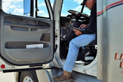 Checking-load-board-in-driver-seat
