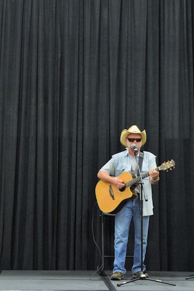 Keith Snyder’s performance built on his prior-day run through his original “Walkin’ the Alligators” in the Trucker Talent Search competition. Read more about the Minn.-based reefer-hauling independent owner-operator and songwriter via this link to the Eric Harley’s Red Eye Radio interview with him.