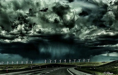 Several of Shannon Royce’s most dramatic landscape photos show rain coming down at a distance, such as this shot of wind turbines in central Wyoming.