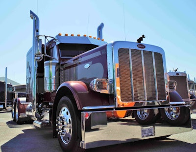Owner-operator Marti’s 2015 “High Maintenance Too” Peterbilt 389 glider, one of his four trucks leased to Transport Services hauling liquid petroleum products in tankers.