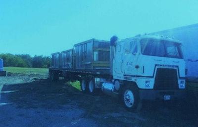 “We ended up painting it white,” Kyle says, “and used it at the shop for years,” shown here with the B&L HVAC business logo on the door.