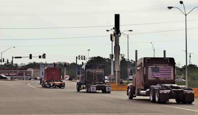 The convoy departing the gathering point at the Joplin Petro at exit 4 on I-44. Bringing up the rear here is Jerry Novak and his 2005 Peterbilt 379.