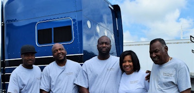 Part of the Atlanta-based Turner Transport team: From left, drivers Dane Thomas and Warren Wiseman, owners Eric and Stacy Turner, and Stacy’s father, McKinley “Doc” Hayward.