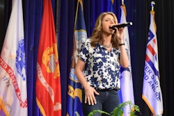 Janine Stange sings the national anthem at the Great American Trucking Show. She also performed this year at the Mid-America Trucking Show and last year at Wreaths Across America, a program that relies on fleets to help get wreaths placed at military cemeteries during the holidays. She will perform for the newly elected president Jan. 20 at the American Legion Salute to Heroes Inaugural Ball.