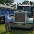 For 18 years, Richard Maxwell has been driving a Caterpillar-powered 1984 Peterbilt 359, pulling a Benson flatbed.