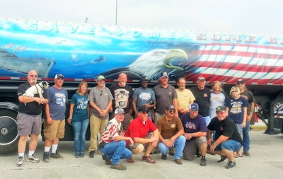 The convoy crew, in front of Farmington, N.M.-based Grant Maxey’s refurbished and (yes) painted 1988 Heil tank trailer.