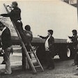 This photo, from the July 1979 issue of Overdrive shows truckers affixing a banner to an ITA member’s trailer.