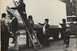 This photo, from the July 1979 issue of Overdrive shows truckers affixing a banner to an ITA member’s trailer.