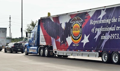In the convoy lead headed out of the Petro September 25 behind videographer Chris Fiffie’s car was driver and veteran Jon Osburn, behind the wheel of the OOIDA Western Star and display trailer.