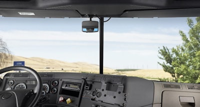 The Lytx DriveCam mounts in the center of the windshield and captures short bursts of video when activated either manually or automatically.