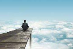 sitting-on-dock-in-clouds