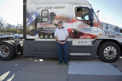 Transport America recognized one of their drivers and military veteran, Robert Harp, on Veterans Day with a custom military truck wrap.