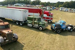 semi trucks in a field
