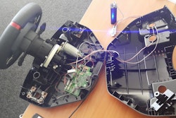 On SoftServe’s website, the company details its work on prototyping the BioLock in a vehicle steering wheel, including this and other photos of its dissembled test wheel.