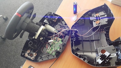 On SoftServe’s website, the company details its work on prototyping the BioLock in a vehicle steering wheel, including this and other photos of its dissembled test wheel.