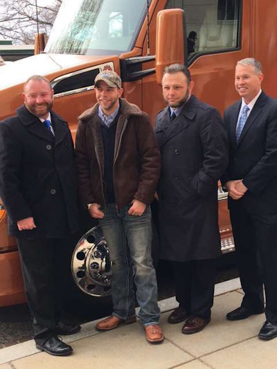 Troy Davidson, far left, won the pictured Kenworth T680 after being named the Top Veteran Rookie Driver. Davidson is an owner-operator with Werner. The award’s other two finalists were, Kevin Scott (second from left) and Russel Hardy, second from right. The three are pictured here with Brad Bentley, director of FASTPORT.