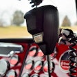 CB mic in a semi-truck with a red dash