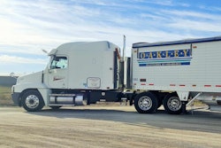 Moore’s 2007 Century Class and hopper trailer.